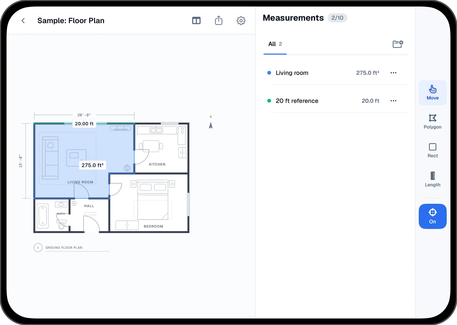 Areaplane on an unfolded iPhone Duo: the sample floor plan with the living room measured, the Measurements panel beside it, and the tool rail on the right edge.